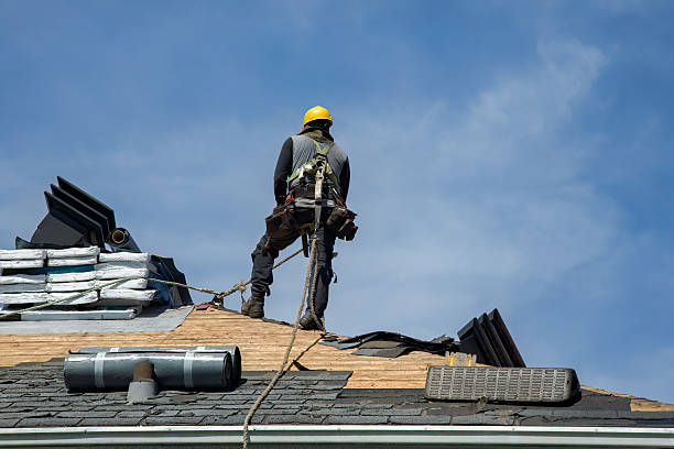 Professional Roof Replacement technician working in Jensen Beach, FL